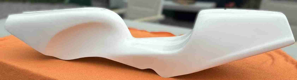 Coque de selle adaptable pour cyclo de course